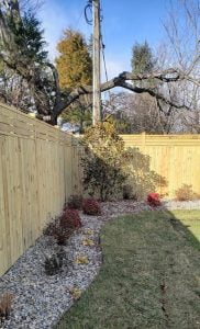 Wood Fence replacements & stone beds