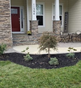 new stone work, entry ways & mulched beds